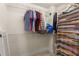 Walk-in closet with wire shelving and a variety of hanging clothes and storage at 4879 Seldon Se Way, Smyrna, GA 30080