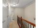 Second floor hallway with a series of closet doors at 4879 Seldon Se Way, Smyrna, GA 30080