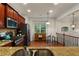A kitchen featuring granite countertops, stainless steel appliances, wood cabinets, with a casual dining area at 4879 Seldon Se Way, Smyrna, GA 30080