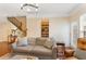 A living room featuring hardwood floors, and comfortable furniture with a view into an office at 4879 Seldon Se Way, Smyrna, GA 30080