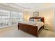 Spacious main bedroom featuring neutral colors and natural light at 4879 Seldon Se Way, Smyrna, GA 30080