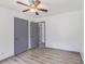 Clean bedroom features wood floors, neutral paint, updated trim and two closets at 5406 Jamestowne Dr, Powder Springs, GA 30127