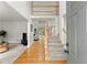 Bright foyer featuring hardwood floors, stairway and second story view at 8032 Ridge Vly, Woodstock, GA 30189