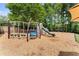 Well maintained community playground with a variety of climbing and playing features at 8032 Ridge Vly, Woodstock, GA 30189