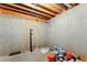 Unfinished basement offers a blank canvas for customization and additional storage, with a concrete foundation at 8032 Ridge Vly, Woodstock, GA 30189