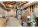 Spacious unfinished basement with exposed ceiling, furnace, and an array of storage boxes at 8032 Ridge Vly, Woodstock, GA 30189