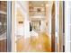 Bright foyer with hardwood floors, soaring ceilings, and an open staircase at 1059 Verbena Way, Auburn, GA 30011