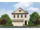 Charming two-story home with neutral siding, attached garage, and nicely landscaped front yard at 1243 Riverstone Rd, Jonesboro, GA 30238
