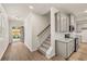 Open-concept kitchen with granite countertops, stainless steel appliances, and easy access to a beautiful pool at 1243 Riverstone Rd, Jonesboro, GA 30238