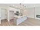 Stylish kitchen features a large center island, custom cabinets, and modern fixtures at 4527 Moray Dr, Mableton, GA 30126