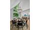 Bright dining room features a modern chandelier and a view of the kitchen at 615 Nw Mark Trail Nw Ct, Atlanta, GA 30328