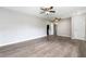 Bright, expansive bedroom featuring new floors, ceiling fans, with multiple doorways enhancing flow and functionality at 2078 Olive Springs Se Rd, Marietta, GA 30060