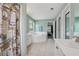 Bathroom featuring double sinks, large soaking tub, and shower at 3123 Morgan Box Ln, Buford, GA 30519