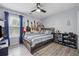 Bedroom with bed and guitars on wall at 3123 Morgan Box Ln, Buford, GA 30519