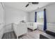 Bedroom with two cribs and wood floors at 3123 Morgan Box Ln, Buford, GA 30519