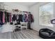 Walk-in closet with ample storage space and natural light at 3123 Morgan Box Ln, Buford, GA 30519