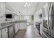 Spacious kitchen with modern appliances and granite countertops at 3123 Morgan Box Ln, Buford, GA 30519