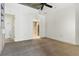 Spacious bedroom with neutral carpet, ceiling fan, closet, and an ensuite bathroom at 44 Peachtree Nw Pl # 1728, Atlanta, GA 30309
