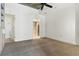 Bedroom featuring neutral carpet, ceiling fan, large closet, and ensuite bath at 44 Peachtree Nw Pl # 1728, Atlanta, GA 30309