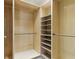 Walk-in closet with custom shelving and storage solutions at 44 Peachtree Nw Pl # 1728, Atlanta, GA 30309