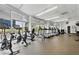 Well-equipped fitness center with state-of-the-art cardio machines and floor to ceiling windows at 44 Peachtree Nw Pl # 1728, Atlanta, GA 30309