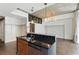 Modern kitchen island with granite countertops, stainless steel appliances, and black tile backsplash at 44 Peachtree Nw Pl # 1728, Atlanta, GA 30309