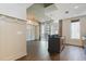 Bright living space featuring a modern kitchen island and floor to ceiling windows at 44 Peachtree Nw Pl # 1728, Atlanta, GA 30309