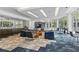 Upscale lounge area with comfortable seating, modern finishes, and ample natural light at 44 Peachtree Nw Pl # 1728, Atlanta, GA 30309