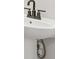 Close-up of a modern bathroom sink with stylish faucet and pedestal at 4523 Moray Dr, Mableton, GA 30126