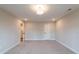 Spacious bedroom features recessed lighting, neutral paint, and plush carpet at 4523 Moray Dr, Mableton, GA 30126