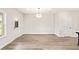 Bright dining area with hardwood floors, recessed lighting, and white trim at 4523 Moray Dr, Mableton, GA 30126