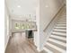 Bright, open-concept home with staircase, modern kitchen with island and cozy living space at 4523 Moray Dr, Mableton, GA 30126