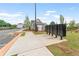 Community mailboxes with a sidewalk leading to a clubhouse and well-maintained landscaping at 4523 Moray Dr, Mableton, GA 30126