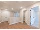 Upstairs hallway boasts wood floors and neutral walls at 4523 Moray Dr, Mableton, GA 30126