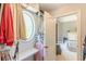Walk in closet with shelving, hanging racks, and a glimpse of a bedroom at 830 Hightower Trl, Oxford, GA 30054