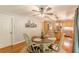Charming dining area featuring a round table, ceiling fan, and decorative shelving at 830 Hightower Trl, Oxford, GA 30054