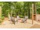 Cozy backyard firepit area perfect for outdoor entertaining at 830 Hightower Trl, Oxford, GA 30054