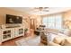 Comfortable living room with hardwood floors, large window, and stylish decor at 830 Hightower Trl, Oxford, GA 30054