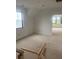 Unfinished attic space with ample natural light, providing potential for a versatile room at 1089 Mount Carmel Church Ln, Canton, GA 30114