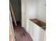Bathroom construction with white cabinets and view into shower room at 1089 Mount Carmel Church Ln, Canton, GA 30114