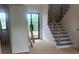 Bright entryway with stairs showcasing the entrance and staircase features at 1089 Mount Carmel Church Ln, Canton, GA 30114