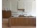Unfinished kitchen features modern cabinetry and an island, ready for customization at 1089 Mount Carmel Church Ln, Canton, GA 30114