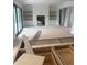 Unfinished living room with fireplace, built-ins, and sliding glass doors leading to outdoor living space at 1089 Mount Carmel Church Ln, Canton, GA 30114