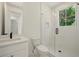 Modern bathroom with walk-in shower, glass door, and sleek vanity at 2150 Tidwell Ln # 5, Atlanta, GA 30318