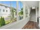 Foyer with large windows, wood floors, and view of the staircase at 2150 Tidwell Ln # 5, Atlanta, GA 30318