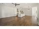 Open floor plan featuring a modern kitchen with island and stainless steel hood vent at 2150 Tidwell Ln # 5, Atlanta, GA 30318