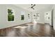 Bright, spacious living room with hardwood floors, ceiling fan and large windows at 2150 Tidwell Ln # 5, Atlanta, GA 30318