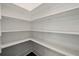 Spacious pantry with multiple white shelves for organized storage at 2150 Tidwell Ln # 5, Atlanta, GA 30318