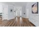 Entryway featuring wood floors, light neutral walls, a decorated front door, and recessed lighting at 3134 Milloak Ct, Buford, GA 30519
