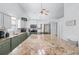 This kitchen has granite countertops, stainless steel appliances, and white cabinets for an inviting look at 3134 Milloak Ct, Buford, GA 30519